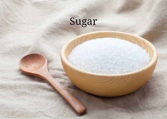 bowl of sugar with a spoon